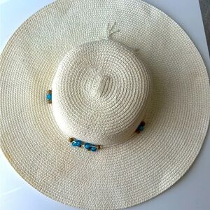 Elegant Cream Sun Hat with Blue Accents